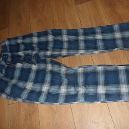 A PAIR OF PYJAMA BOTTOMS ADJUSTABLE ELSTICATED WAIST AND INSIDE LEG 72 CM. PICK UP FROM M40 1NS OR £3.49 POSTAGE