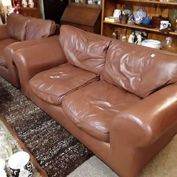This medium brown real leather two-seater sofa is in good all-round used condition...

70 inches long x 35 inches deep x 34 inches high.

PLEASE NOTE: The other matching sofa pictured is NOW SOLD... Just the one left.

Our second hand furniture mill shop is LOW COST MOVES, at St Paul's trading estate, Copley Mill, off Huddersfield Road, Stalybridge SK15 3DN...Delivery available for an extra charge.

There are some large metal gates next to St Paul's church... Go through them, bear immediate left and we are at the bottom of the slope, up from the red steps... 

If you are interested in this or any other item, please contact me on 07734 330574, or on the shop 0161 879 9365...Many thanks, Helen.

We are OPEN Monday to Friday from 10 am - 5 pm and Saturday 10 am -  3.30 pm.. CLOSED Sundays.