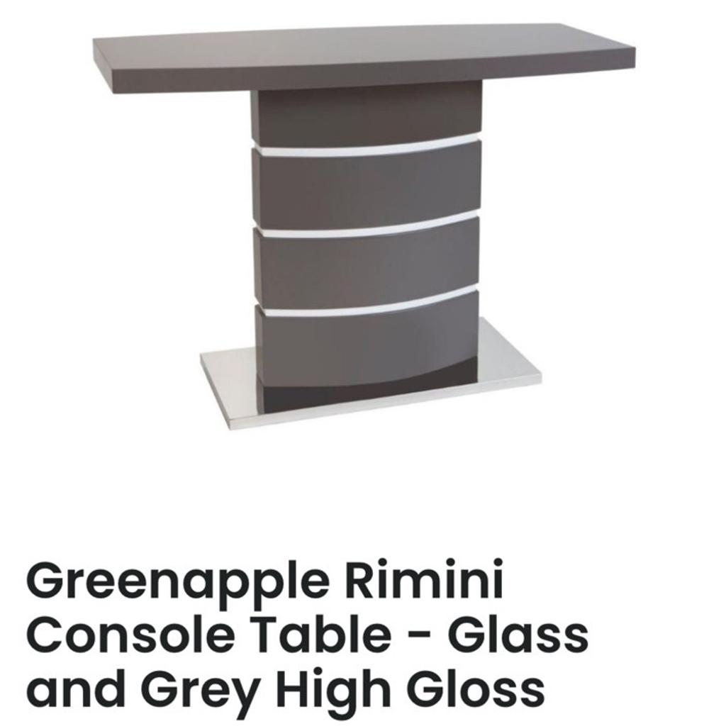 Create a stylish statement in your home with the Rimini extendable grey dining table with console unit.

Items has Stainless steel base and 4mm tempered glass top. Each piece is complete with a high gloss finish.

Dining table is complete with six dining chairs.

The pieces are already assembled however they are very heavy and may need 2 people.
DIMENSIONS
Dining Table/ 160 X 90 X 75 Cm
Extending dining table has width of 215cm when fully extended.

Items can be purchased as a pair or individually.

Rimini Console Table £100
Extendable Grey Dining Table and 6 chairs £550

Or both pieces for £600