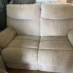Cream two seater reclining settee very comfortable. No marks or rips very good condition. Only selling as I have moved in one bedroom flat and add to downsize. Dy12pd collection only