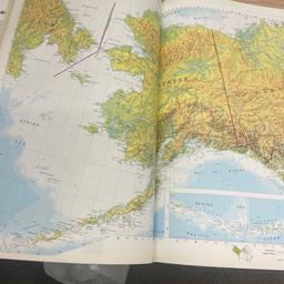 Readers digest full world atlas this is a big book very detailed too.