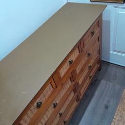 very heavy pine nine draw rattan type bedroom chest of draws size is 45 inches length by 15 inches wide. plus 32 inches high.nice piece of furniture first to see will buy grab a bargain.80 pounds no offers collect only. RING for details.