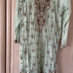 Worn once for a wedding. Dress with scarf and trousers. Trousers has got some beads at the bottom for detail. Just under the arms there are some pulls but can be seen in third pic.