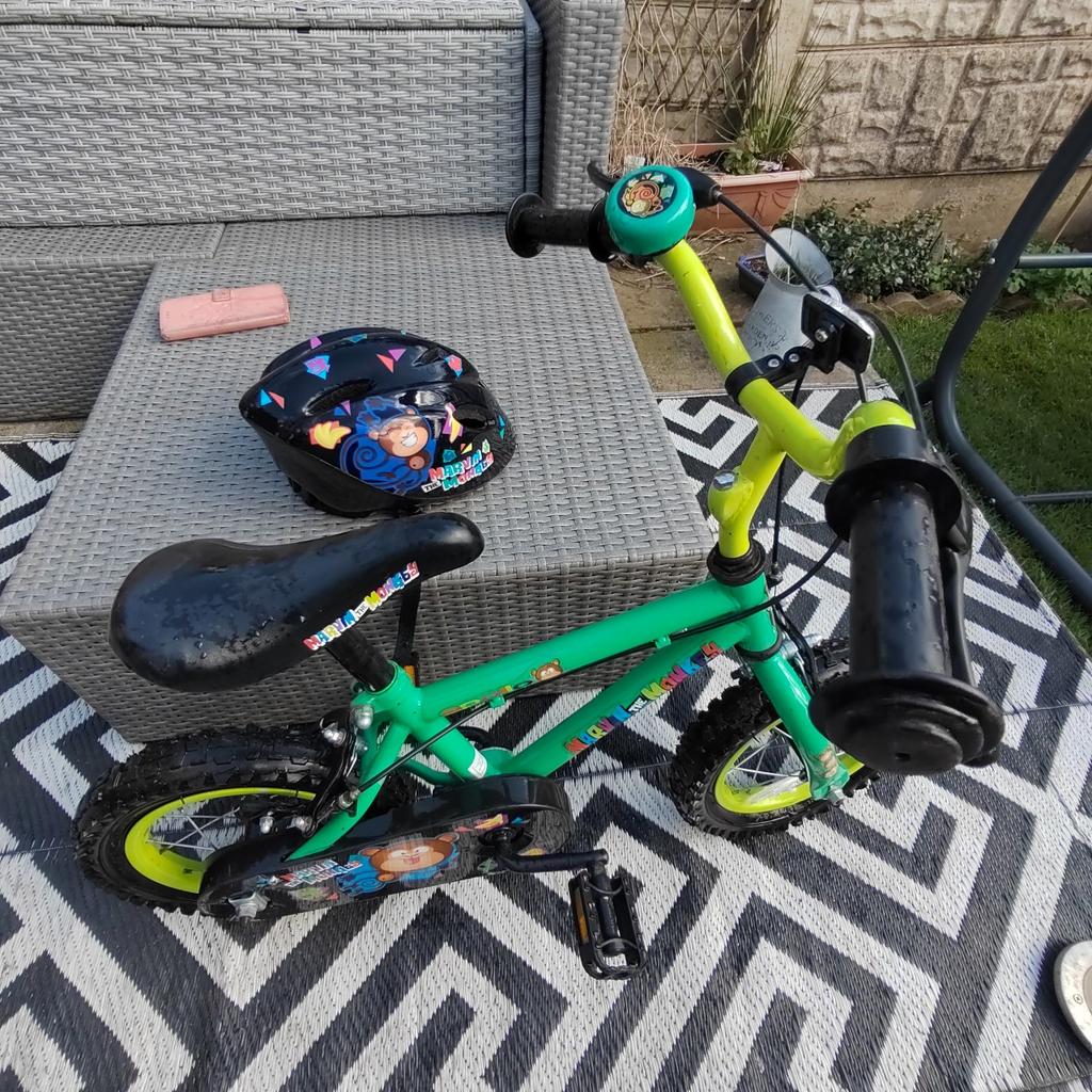 Child's Marvin the Monkey bicycle and helmet, kept inside a shed, pneumatic tyres, helmet was hardly ever worn so looks brand new