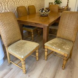 Grab yourself a bargain 
6 wicker back dining chairs solid and in great condition available now, come from a smoke and pet free environment, thanks for looking