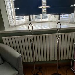 2 x Matching floor lamps. Very good condition. The shades are B & Q and are on sale at £32 each. These can also be used as ceiling shades. Happy to sell separately. Pick up only.