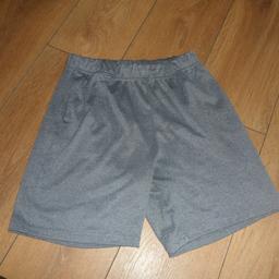 A STRETCHY PAIR OF BOYS SHORTS WITH 21 SIDE POCKETS 12-13 YEARS. PICK UP FROM M40 1NS OR POSTAGE £3.49