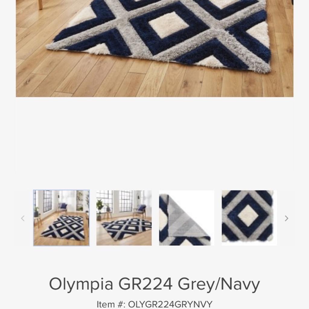 Large rug 7’x 5’ grey and blue, pet and smoke free home
