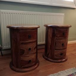 2 round sheesham cadinates, immaculate condition solid heavy units smoke free home, collection only thanks. 21in x. 18 in, with drawers.