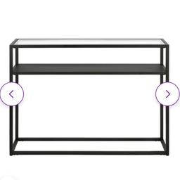 Black console hall table, black metal, has a glass shelf reinforced glass underneath 127cm x 25cm depth x 76 high