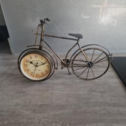 Vintage style bike with clock in wheel. Can deliver for fuel