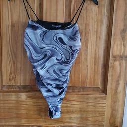 Women's Select black and white bodysuit size small worn a couple of times like new.  From a smoke and pet free home.