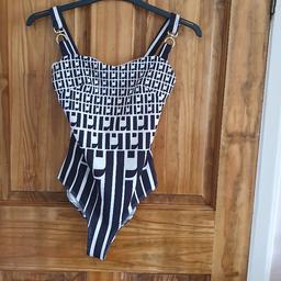 Women's River Island bodysuit size small petite black and white. Worn once so like new from a smoke and pet free home.
