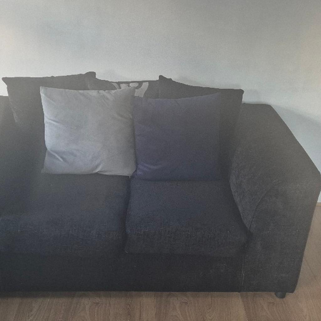 3 and 2 set black sofas in good condition only had them a year