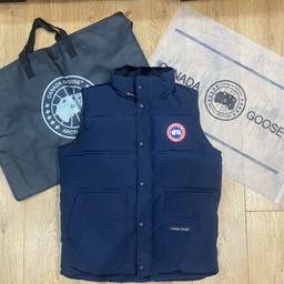 Presenting the Canada Goose Vest (gilet) in navy- size M.

Brand-spanking new with all of its necessary tags still attached to it including the optional, branded dust-proof bag to complete the package. 

(Happy to entertain any viable offers)

We also offer a referral loyalty program like no other for you, your family and friends - message to find out more. 

For anymore information about the aforementioned/authenticity about the product(s) we sell or any other queries at all, please do not hesitate to message us here or via snapchat (@saucevault)


@saucevault, we offer:

• The highest quality one-to-ones on the market which you’ll never get called out for
• Guaranteed same day/next-day nationwide shipping 
• 100% transparency between us and customer communications with any queries to ensure customer satisfactions are met 

#moncler #mooseknuckles #drip #designer #summer