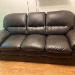 Dark brown 3 Seater faux leather sofa in very good condition except for wear and tear on both arms and middle seat. Bought 2 years ago.