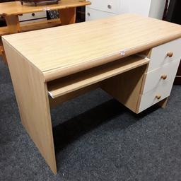 This light wood veneered desk with three white drawers is in good overall used condition. It comes with a pull out computer shelf... The drawers are not aligned perfectly however and the drawers need a good push in order to close properly or each drawer needs lifting by hand slightly so the drawer underneath will close.

47.5 inches long x 2 ft deep x 31 inches high.

Our second hand furniture mill shop is LOW COST MOVES, at St Paul's trading estate, Copley Mill, off Huddersfield Road, Stalybridge SK15 3DN... Delivery available for an extra charge.

There are some large metal gates next to St Paul's church... Go through them, bear immediate left and we are at the bottom of the slope, up from the red steps... 

If you are interested in this or any other item, please contact me on 07734 330574, or on the shop 0161 879 9365...Many thanks, Helen. 

We are OPEN Monday to Friday from 10 am - 5 pm and Saturday 10 am - 3.30 pm... CLOSED Sundays. CLOSED Bank Holiday long weekends...