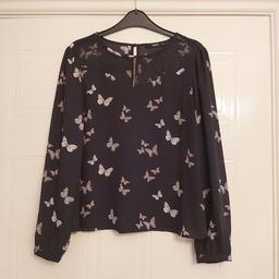 oasis long sleeve very smart with lace on the top & butterflies on size 12 like new collection only