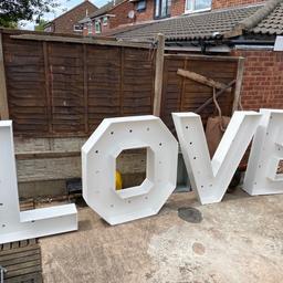 Large love letters for sale no backs on them exhire stock could do with painting them no lights in side them ..holes inside them for lights .. will need a van to collect 47 inches high x 35 to 40inches wide