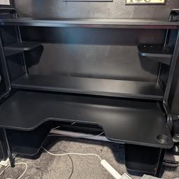 Fantastic solid desk made of black wood and metal.
Lots of storage space with added cup holders , movable shelf’s that can be placed laced in various locations to suit needs plus 4 peg type hooks . It’s a fantastic desk and holds a lot and only selling due to moving house. In excellent condition only purchased 5 months ago. Only issue is one shelf has two very small white squares that can’t really be seen but this is reflected in price. It’s all collapse and should fit into boot with seats down in most cars. Any questions please feel free to ask
Paid over £200!just a few months ago. Selling fur £100 Ono