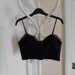 Bra “In The Style” Bralette Bust Lace Crop Top

 Black Colour Adjustable Strap

New With Tags

Bust has the sticks 2 units on back

2 units under the right breast

2 units under the left breast

Actual size: cm

Length: 15 cm from armpit side

Breast volume: 78 cm - 80 cm

Depth bust: 13.5 cm

Size: 8 (UK) Eur 36,US 4

Shell: 41 % Polyamide
 34 % Cotton
 25 % Viscose

Lining: 100 % Polyester

Made in China