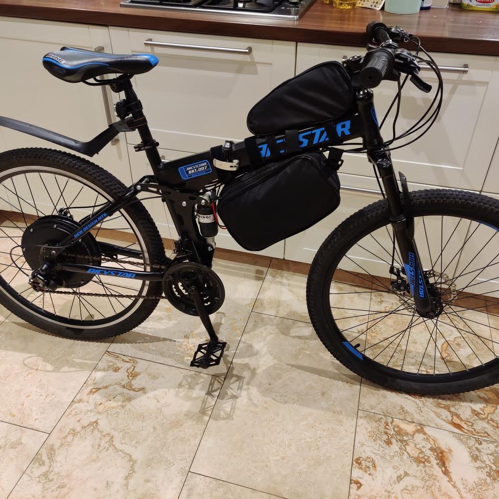 1500w folding e-bike. Can reach speeds of up to 30mph.
Can fold in half for easy storage. Dual suspension for a comfortable ride.
Bike frame itself is in very good condition. The electric motor kit is brand new. Only used to test ride so far.

48v battery.
£850