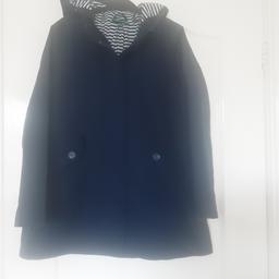 Girls age 10-12 more age 10 navy blue
hooded Mountain Warehouse coat
lined full zip press studs very very good
clean condition