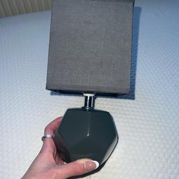 Grey small bedside lamp, in good condition. Selling due to buying a bigger one