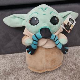 selling a new with tag plush baby yoda eating a frog 
comes from smoke free pet free home 
collection from b9 area cannot deliver