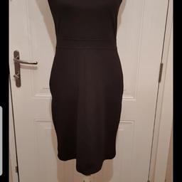 Stunning Black Figure Hugging Dress 
Beautiful Black Ruffle Around Neckline 
Lovely N Stretchy,  
Pull On Dress 
Excellent Condition 

🌟🌟 Plz see all photos 🌟🌟

👚👛🧥 Please take a look at my other listings 👖👙👗

👍👍Thanks for looking👍👍
🛍👛 Happy Shopping 🛍
