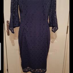 Stunning Navy Lace Dress
Fully Lined 
Fan Sleeves 
Zip Back Fastening 
Excellent Condition 

🌟🌟 Plz see all photos 🌟🌟

👚👛🧥 Please take a look at my other listings 👖👙👗

👍👍Thanks for looking👍👍
🛍👛 Happy Shopping 🛍