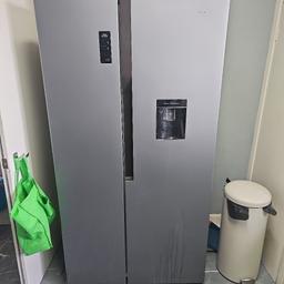logik American fridge freezer with water dispenser with a fulling up water tank has a small stain on the lower right side door, unable to remove at the moment it could be sprayed to get rid of it the fridge freezer is otherwise in good condition mainly a few dents and scratches that isn't that noticeable kept clean over the years must go ASAP thanks willing to negotiate thanks