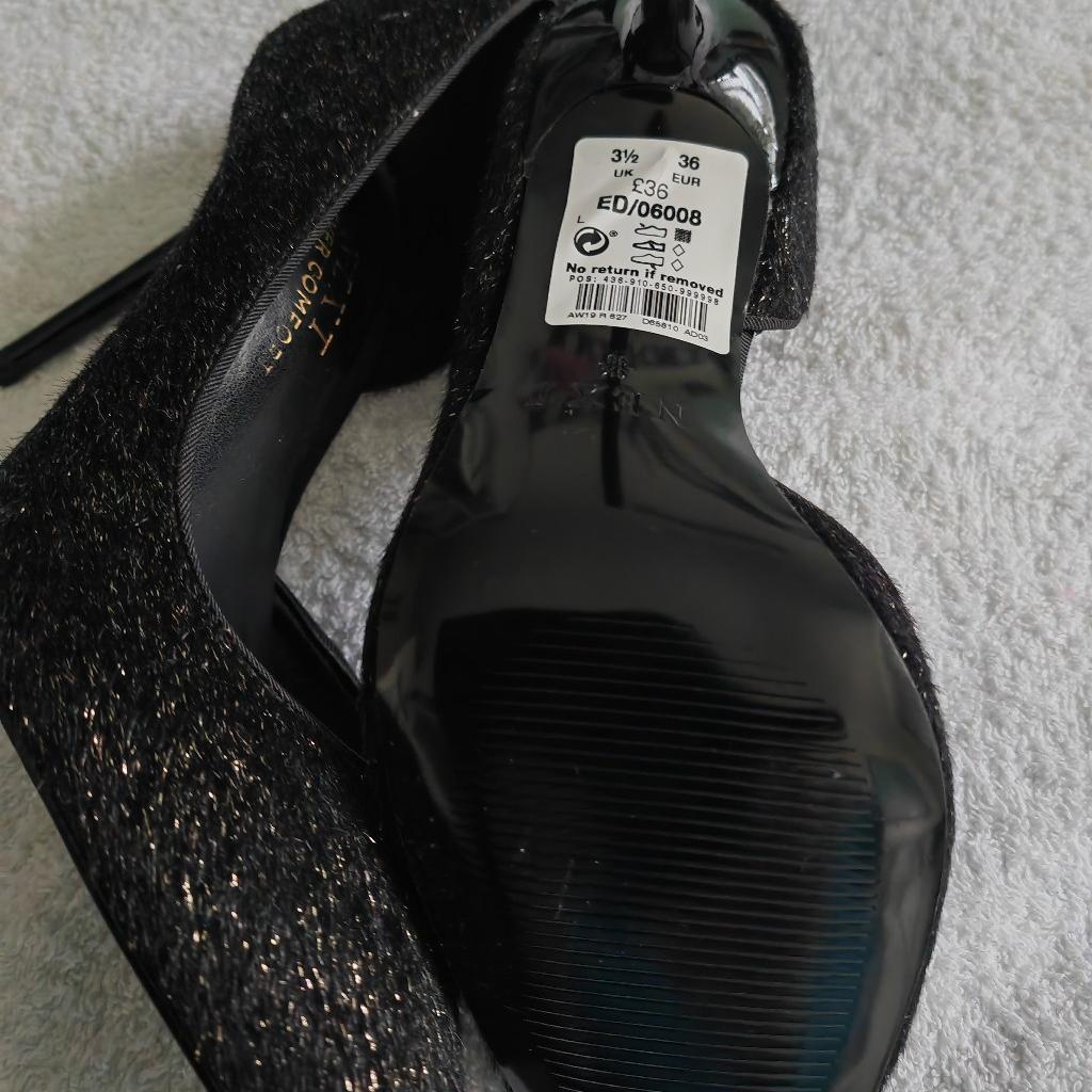 Ladies/teens black high heels these are black glitter ideal for going night out weddings etc these are next forever comfort heel is roughly 3.5- 4 inches new with tags paid £36 selling for 20.00 bargain price collection only
 from Glascote b77