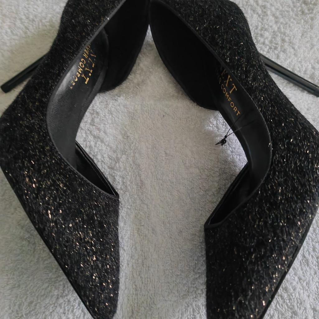 Ladies/teens black high heels these are black glitter ideal for going night out weddings etc these are next forever comfort heel is roughly 3.5- 4 inches new with tags paid £36 selling for 20.00 bargain price collection only
 from Glascote b77