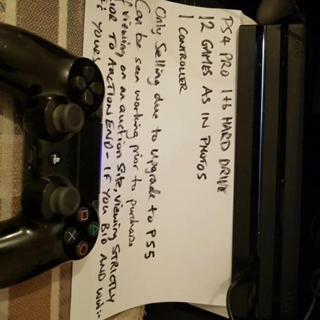 Sony PlayStation 4 Pro 1TB With black Controller, AND 20 GAMES! *PS4 PRO*. Condition is "Used". Be fully aware you are not buying a new console but a fully working used console. Cash on collection or post for £8.55 Royal Mail 48hr tracked. I can offer free local delivery within 10 miles of my postcode which is LS104NF. photo of 12 games included. Only selling due to up grade to ps5. Adult owned so it's not been bounced around a bedroom. Ps photo 5 is just to show it's fully working. It will be g