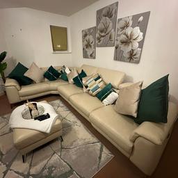 Up for sale I have a cream/beige leather sofa with matching footstool. Left end seat reclines. Silver legs. Purchased from DFS for £3597. With 1 extra year left of Sofa Care for any damages to the sofa. More than welcome to answer any questions.