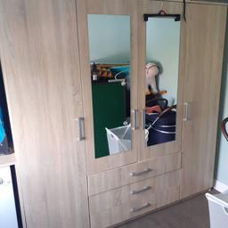 4 doors with mirror and 3 large draws. internal shelves. can be dismantled for collection