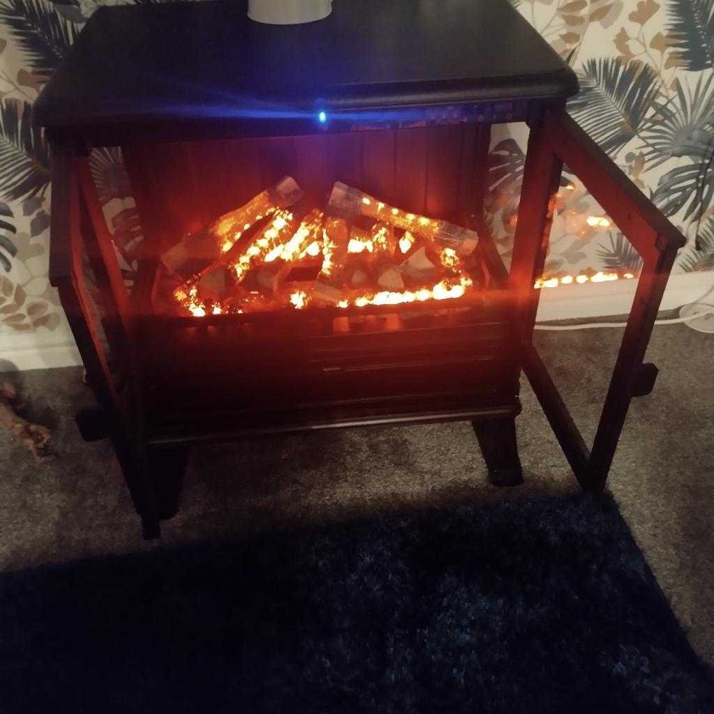 large dimplex electric fire, heater has 2 heat settings which works fine, and fire glow works when switched on. should have a flame effect but needs a new part. cost nearly a thousand when new