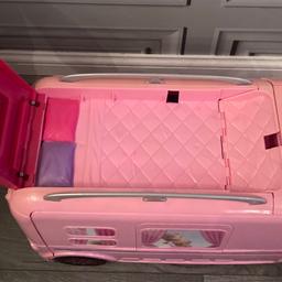Barbie camper van opens out to a swimming pool