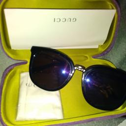 genuine Gucci sunglasses with case, cleaning cloth,case and certificate of authentication gg0079sk 002 56[]19-145 in excellent condition