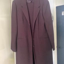 Lovely suit worn once to wedding been just hanging in wardrobe trousers size 14 jacket 16 plum in colour