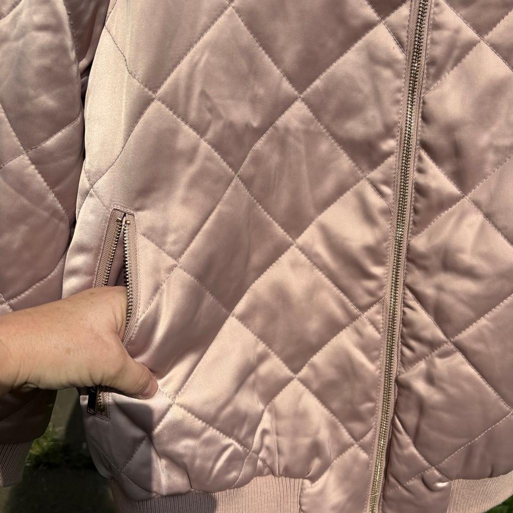 Gorgeous nes look bomber jacket. New never worn cost double this. Nougat Pink quilted bomber jacket. Zip up front with zip pockets too. Lovely jacket .