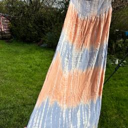 Gorgeous summer sundress . Great  tye dye maxi dress . Peach and grey with ruched top and long skirt.  Lovely dress for long sunny days . Fits most sizes with this style not just 18 .
