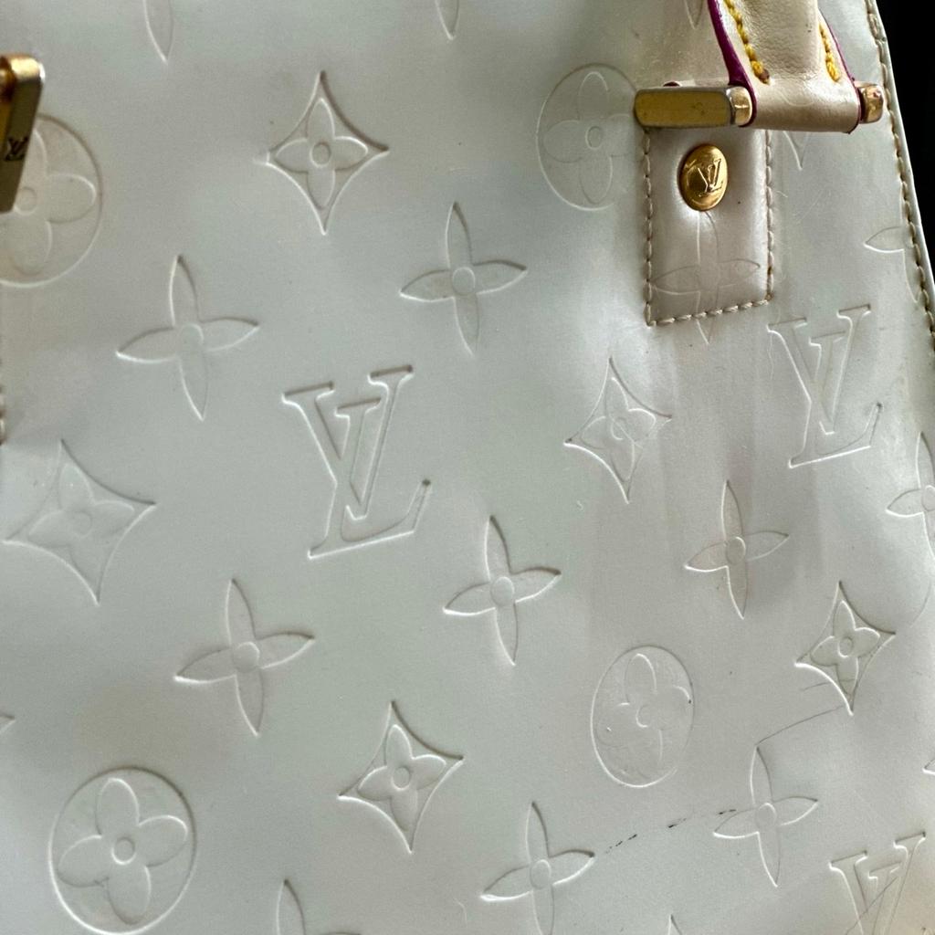 Much loved and admired Louis Vuitton handbag- perfect for weddings, prom nights, or showing off!