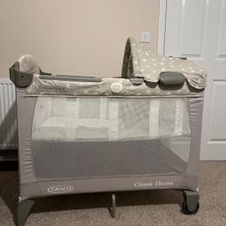Graco Classic Electra travel cot 
Perfect condition 
Hardly used 
Comes with all parts - travel mattress, removable canopy & mobile, removable changing table, removable music/sounds
Comes with bag