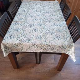 Table and 6 chairs for sale, few marks on the seats but would be fine with a clean. Would be ideal for upcyling or would look amazing with a good polish