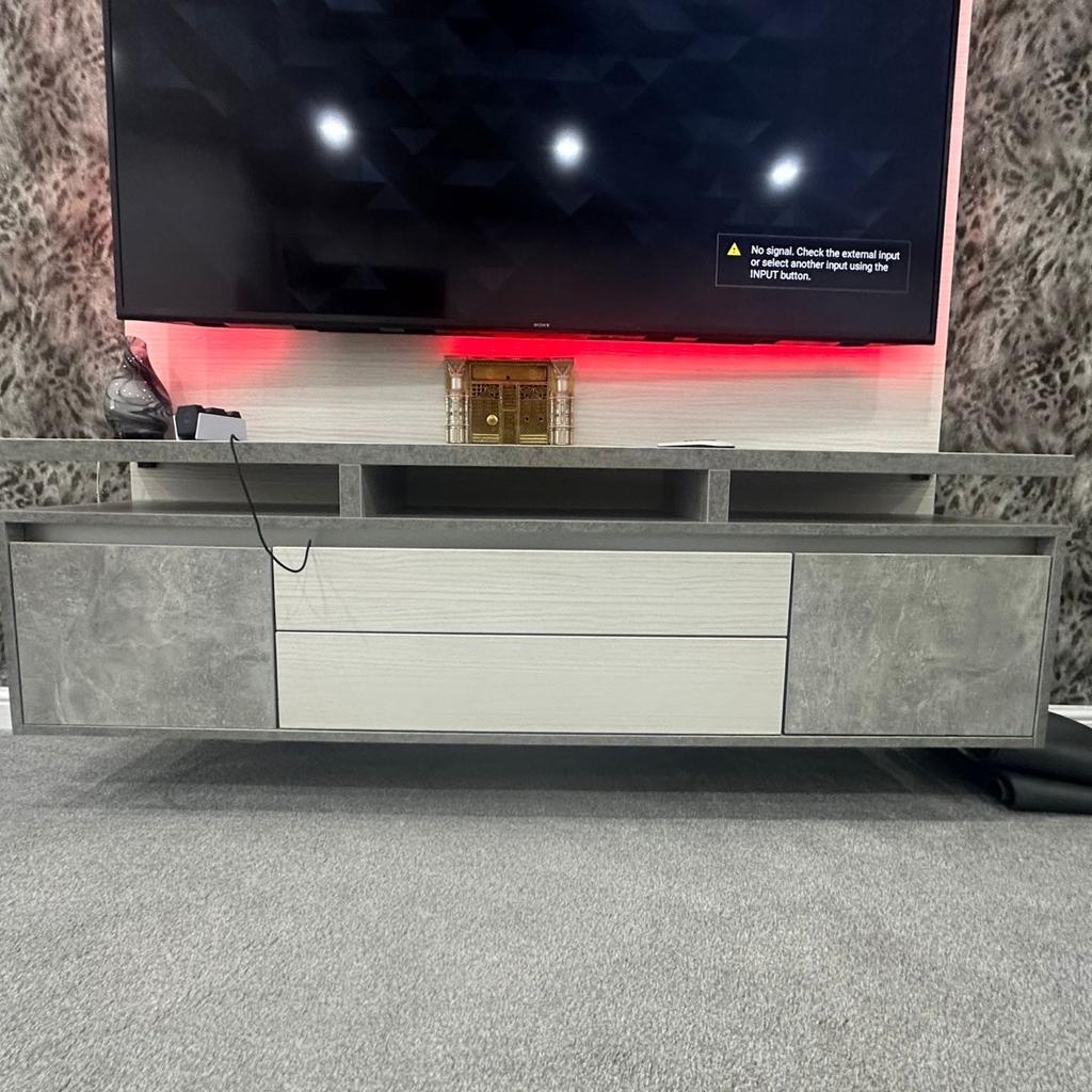 Media wall unit, immaculate condition, just 6 months old. Currently have a 75” tv as seen on picture on the unit, tv not for sale just the unit. Comes with LED lights. Paid over £1,800 will accept decent offers in the region of £700. Buyer must bring own joinery to remove