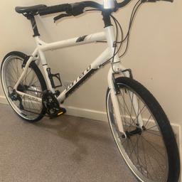 As long as you see it, still advertised means it’s still available for straight cash buyer in hand on collection only outside SE152JR Hi am selling my white 20 inch suitable fit for adults from 5 foot 11, or below adults around 6 foot tall can still get away with cycling on it with the saddle high unless they have longer upper body and shorter legs. Then they may be able to get away with it, but that’s down to the individual self 21 speed Shimano trigger shifter, gas and brakes. with 26 inch alloy silver rims Carrera hybrid bicycle it’s had new tires and grips and pedals and inner tubes brake cables. Yes has somewhere and tear on the frame like anything. Secondhand wood but overall fully functionable gets you from a to B would make a nice electric bike conversion or just a standard every day commuter to get to and from work or the gym, or everyday fitness on what you see of the cycle is what you get. Thanks for looking all the best no time wasters please or scammers or browser