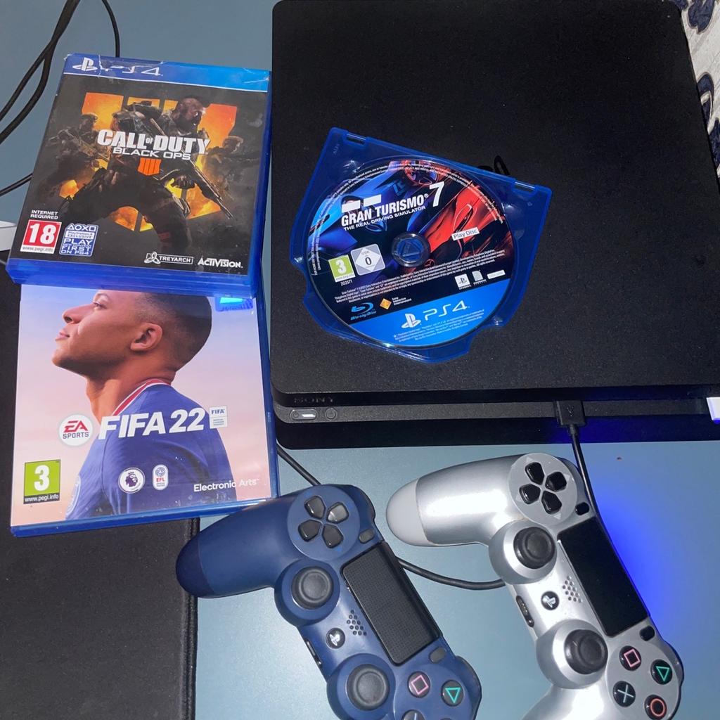 This is a Ps4 Slim. It is in good quality and comes with all the wires and a charger. Also comes with granturismo 7, Fifa22 and black ops 4. It is 500gb and comes with 2 ps4 duelshock controllers(Gray and darkish blue) MESSAGE ME FOR MORE PICTURES AND INFORMATION!