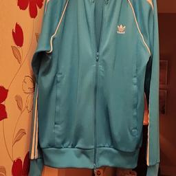 Adidas top. size medium. new. was £59. bargain. £20. excellent condition.